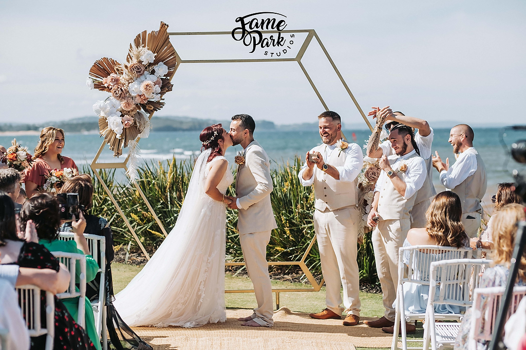 The young couple had their first kiss as husband and wife at Long Reef Golf Club