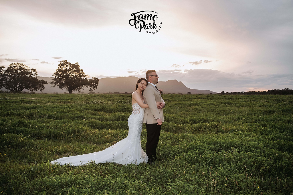 a sunset wedding photo with breathtaking natural view