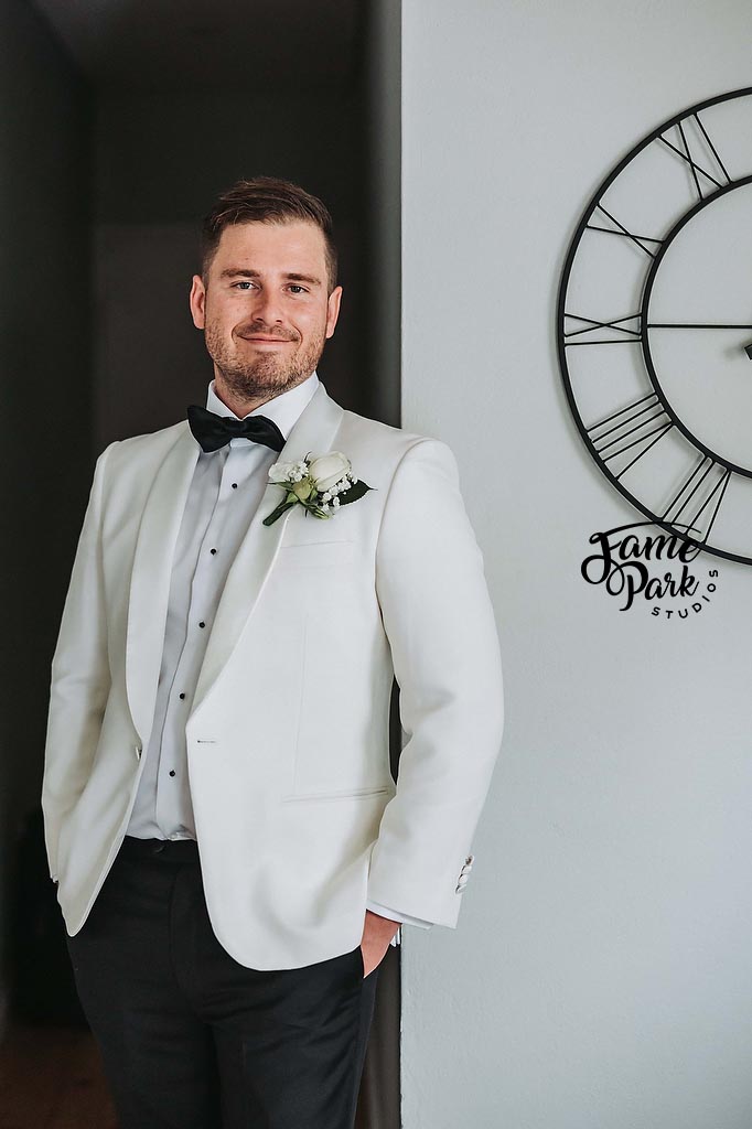 The groom’s portrait shots with his suit