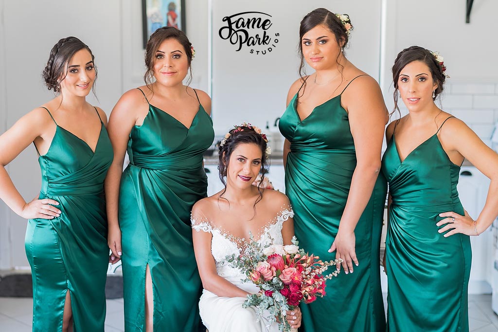 A group photo of the bride with her bridesmaid before the wedding