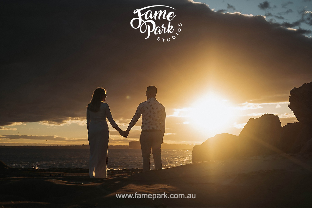 The magnificent sunset photo of a man and a woman holding their hands