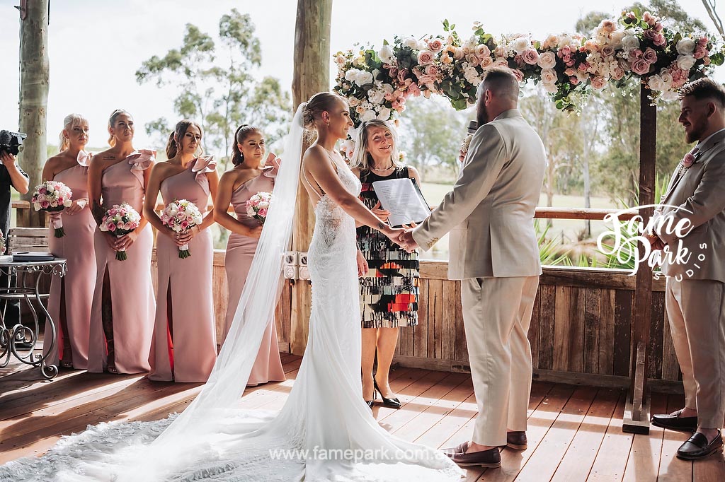 A couple exchanges vows at a wedding ceremony in one of the best wedding venues in Newcastle.