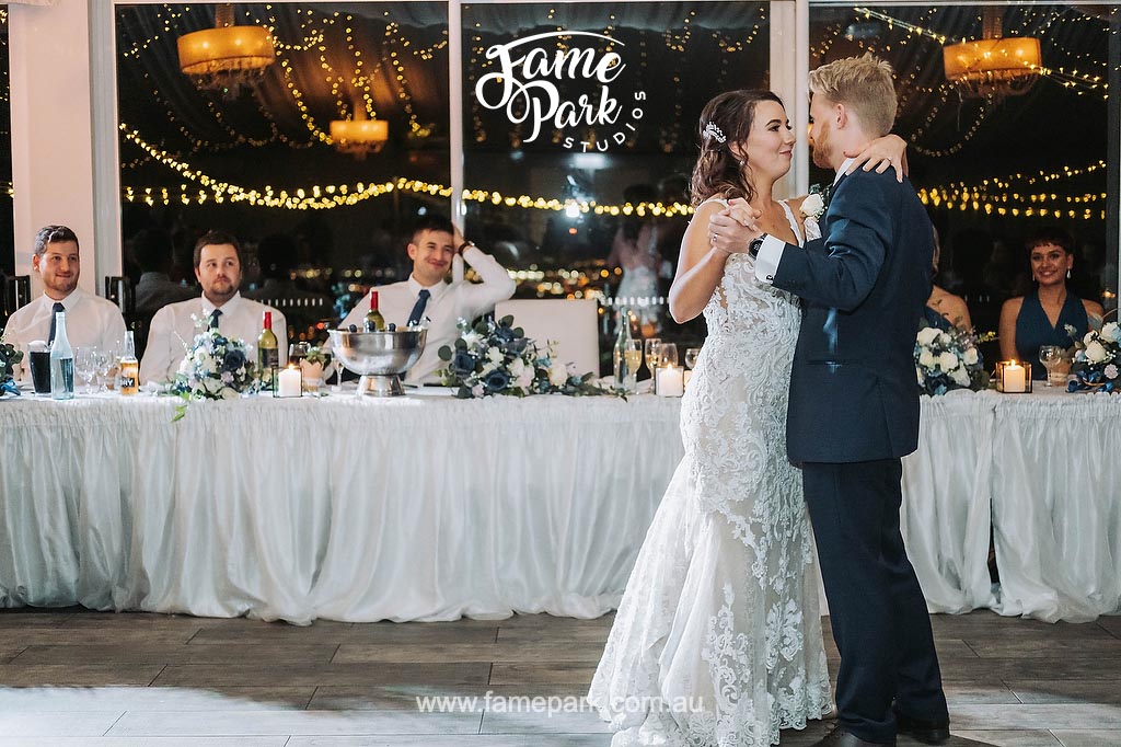 Bride and groom sharing first dance at Panorama House